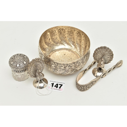 147 - A SMALL GROUP OF LATE 19TH/20TH CENTURY INDIAN WHITE METAL, comprising a circular sugar bowl with ga... 