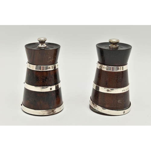 154 - A PAIR OF GEORGE V SILVER MOUNTED TREEN PEPPERMILLS OF MILK CHURN OUTLINE, each mounted with three h... 