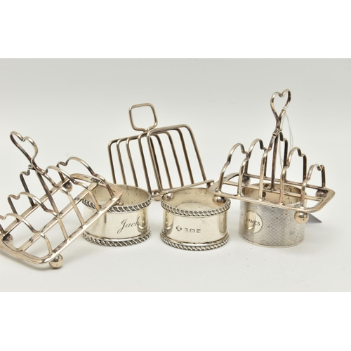 157 - A SMALL PARCEL OF 20TH CENTURY SILVER, comprising a small pair of late Victorian five bar toast rack... 