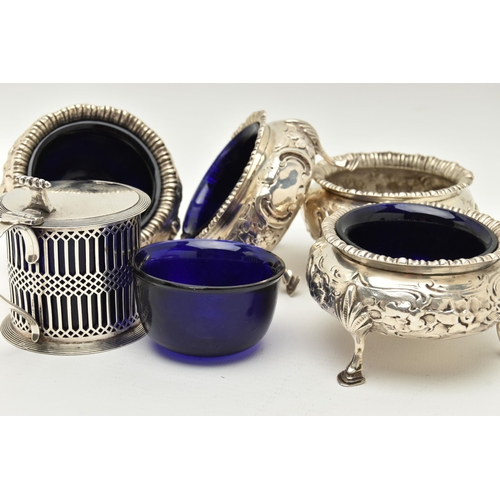 160 - A SET OF FOUR VICTORIAN SILVER CAULDRON SALTS AND AN EDWARDIAN SILVER MUSTARD, the salts with foliat... 