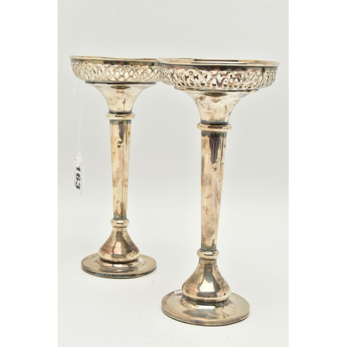 163 - A PAIR OF SILVER POSY VASES, round pierced rims on tapering stems, round weighted bases, hallmarked ... 