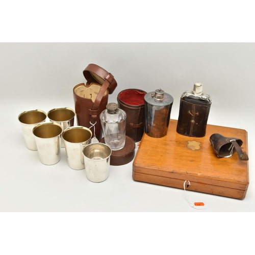 165 - THREE LEATHER CASED DRINKING ITEMS AND A LATE VICTORIAN OAK CASED CANTEEN OF MOTHER OF PEARL HANDLED... 