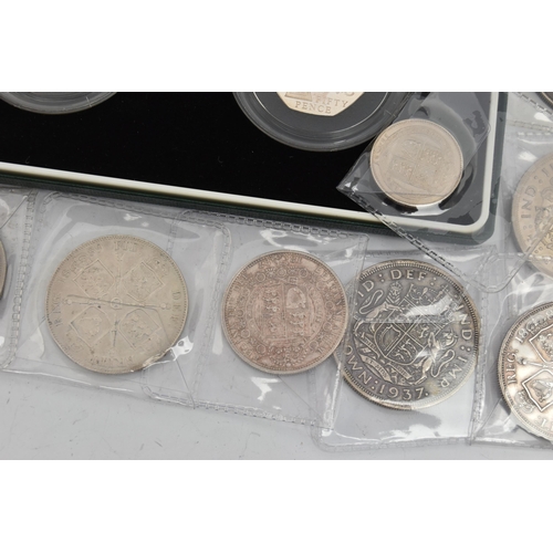 216 - A PARCEL CONTAINING SILVER UK COINAGE, to include The Victoria Cross 2 coin set of 50p silver proof ... 