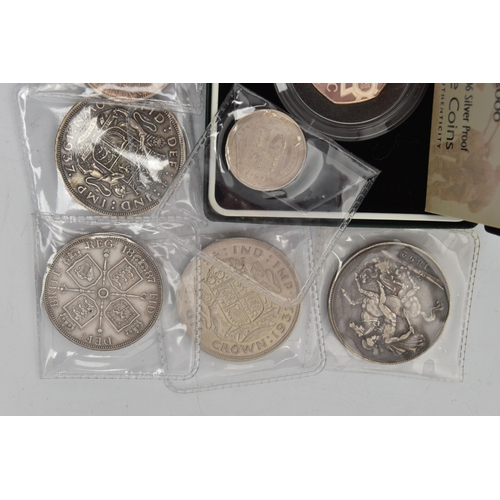 216 - A PARCEL CONTAINING SILVER UK COINAGE, to include The Victoria Cross 2 coin set of 50p silver proof ... 