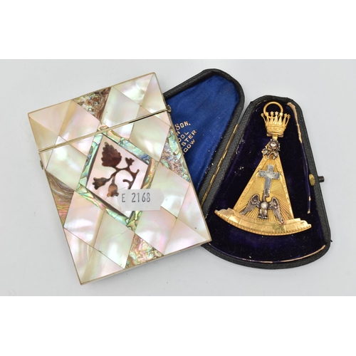 226 - A MASONIC PENDANT AND CARD CASE, a gilt Rose Croix masters jewel, depicting a pelican feeding her yo... 