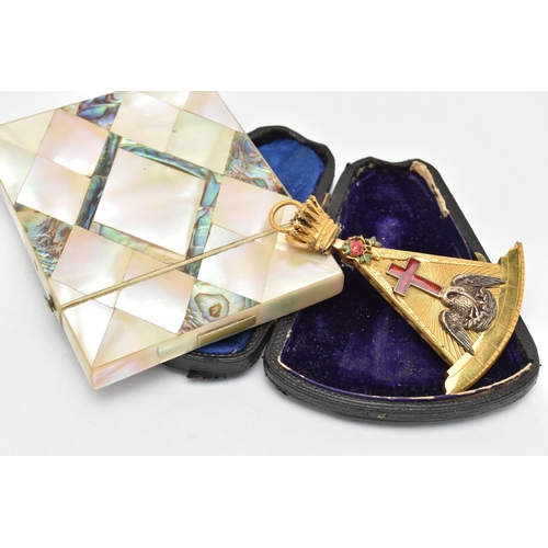 226 - A MASONIC PENDANT AND CARD CASE, a gilt Rose Croix masters jewel, depicting a pelican feeding her yo... 