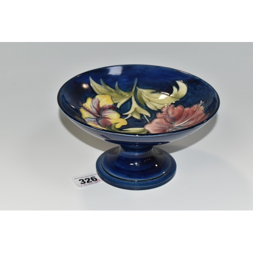 326 - A MOORCROFT POTTERY HIBISCUS PATTERN COMPORT, decorated in the Hibiscus pattern on a blue ground, si... 