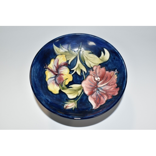 326 - A MOORCROFT POTTERY HIBISCUS PATTERN COMPORT, decorated in the Hibiscus pattern on a blue ground, si... 