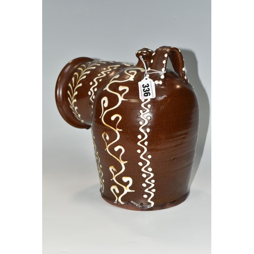 336 - A BROWN AND WHITE EARLY TWENTIETH CENTURY SLIPWARE SALT PIG, with trailed decoration, inscribed 'Dr.... 