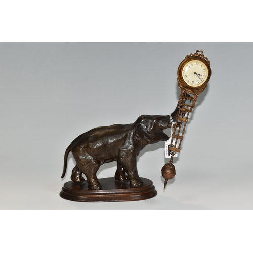 342 - A SPELTER SWINGING ELEPHANT CLOCK, a twentieth century spelter elephant clock, the dial and movement... 