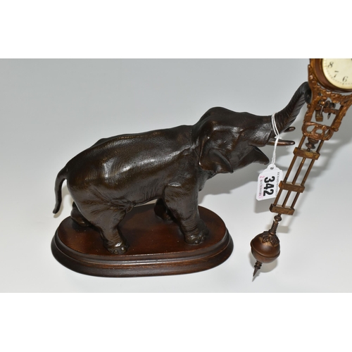 342 - A SPELTER SWINGING ELEPHANT CLOCK, a twentieth century spelter elephant clock, the dial and movement... 