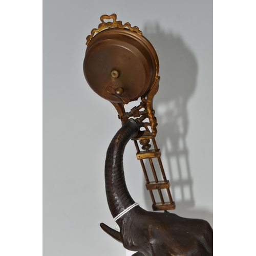 342 - A SPELTER SWINGING ELEPHANT CLOCK, a twentieth century spelter elephant clock, the dial and movement... 