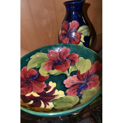 343 - A LARGE MOORCROFT POTTERY BOWL AND VASE, comprising a bowl decorated with the Hibiscus pattern on a ... 