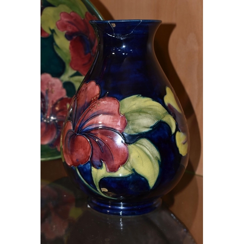 343 - A LARGE MOORCROFT POTTERY BOWL AND VASE, comprising a bowl decorated with the Hibiscus pattern on a ... 