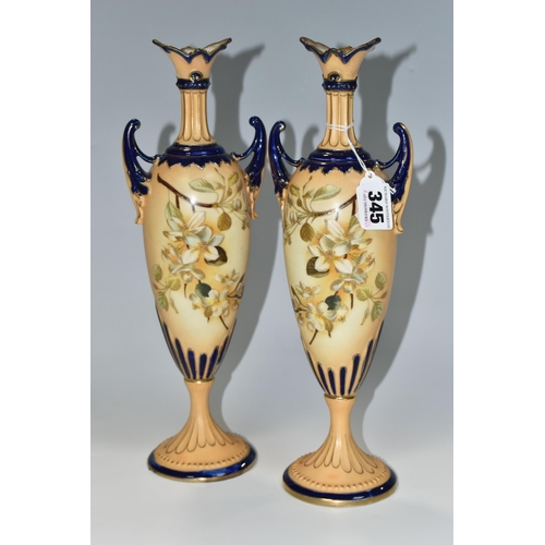 345 - A PAIR OF LATE NINETEENTH CENTURY AUSTRIAN PEDESTAL VASES, hand painted blossom design on a blush iv... 