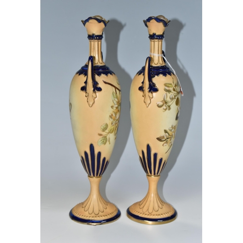 345 - A PAIR OF LATE NINETEENTH CENTURY AUSTRIAN PEDESTAL VASES, hand painted blossom design on a blush iv... 