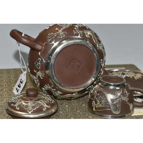 347 - A PRESENTATION BOXED SET OF CHINESE TEAWARE, comprising Chinese engraved pewter clad teapot, four cu... 