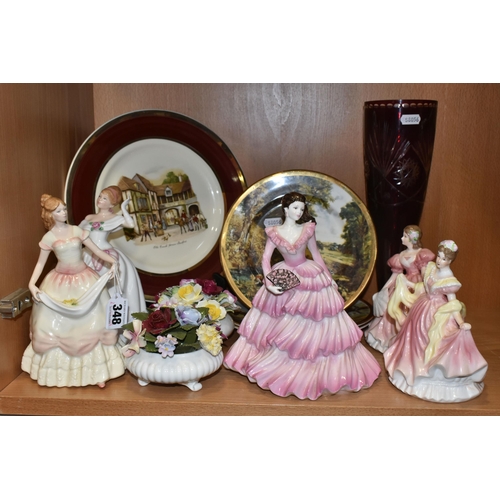 348 - A GROUP OF NAMED CERAMICS, comprising a Coalport Ladies of Fashion 'Gabrielle' (reglued head), a Roy... 