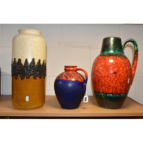 350 - A MID TWENTIETH CENTURY FLOOR VASE AND TWO LARGE JUGS,  comprising a large red, green and black jug,... 