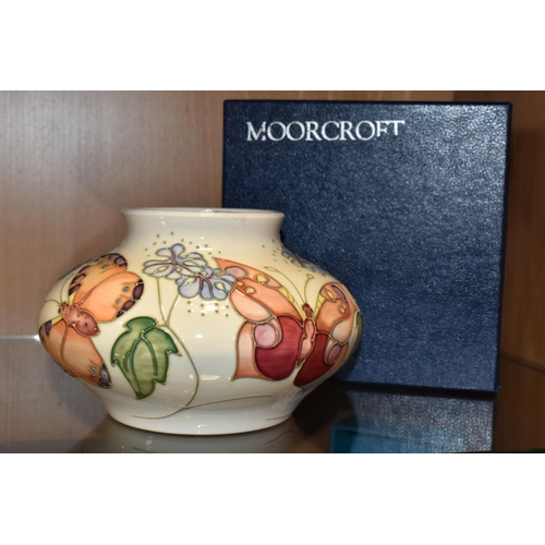 351 - A BOXED MOORCROFT POTTERY 'BUTTERFLY' PATTERN VASE, designed by Sally Tuffin, the squat baluster vas... 