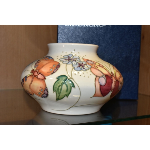 351 - A BOXED MOORCROFT POTTERY 'BUTTERFLY' PATTERN VASE, designed by Sally Tuffin, the squat baluster vas... 