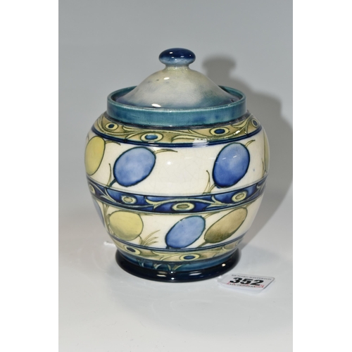 352 - A MOORCROFT POTTERY 'BANDED HONESTY' PATTERN POT, circa 1930, the main central blue and green design... 