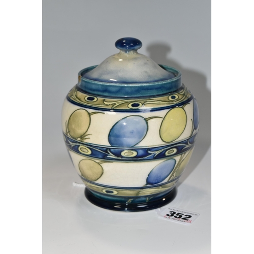 352 - A MOORCROFT POTTERY 'BANDED HONESTY' PATTERN POT, circa 1930, the main central blue and green design... 