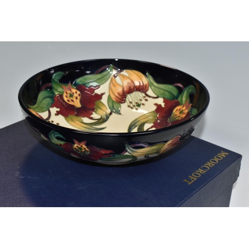 364 - A BOXED MOORCROFT POTTERY 'ANNA LILY' DESIGN BOWL, designed by Nicola Slaney, diameter 26cm (1) (Con... 