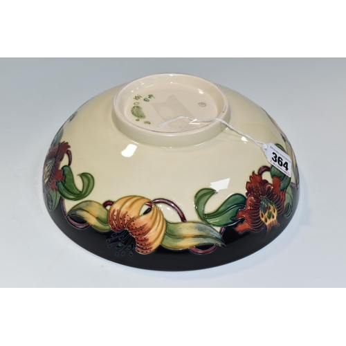 364 - A BOXED MOORCROFT POTTERY 'ANNA LILY' DESIGN BOWL, designed by Nicola Slaney, diameter 26cm (1) (Con... 