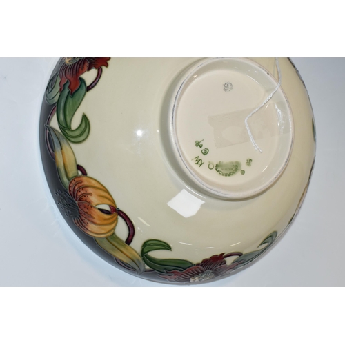 364 - A BOXED MOORCROFT POTTERY 'ANNA LILY' DESIGN BOWL, designed by Nicola Slaney, diameter 26cm (1) (Con... 