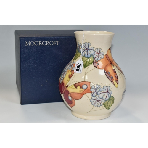 368 - A BOXED MOORCROFT POTTERY 'BUTTERFLY' PATTERN VASE, designed by Sally Tuffin, the baluster vase tube... 