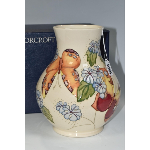 368 - A BOXED MOORCROFT POTTERY 'BUTTERFLY' PATTERN VASE, designed by Sally Tuffin, the baluster vase tube... 