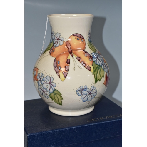 368 - A BOXED MOORCROFT POTTERY 'BUTTERFLY' PATTERN VASE, designed by Sally Tuffin, the baluster vase tube... 