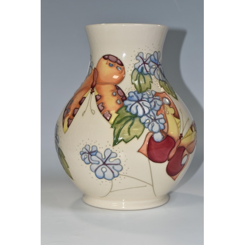 368 - A BOXED MOORCROFT POTTERY 'BUTTERFLY' PATTERN VASE, designed by Sally Tuffin, the baluster vase tube... 