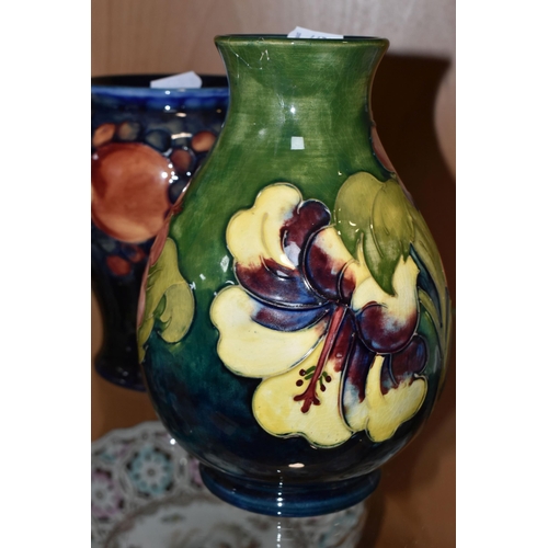 377 - FIVE MOORCROFT POTTERY VASES, all af, comprising a small Pomegranate pattern vase, height 8.5cm (sec... 