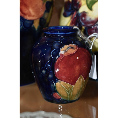 377 - FIVE MOORCROFT POTTERY VASES, all af, comprising a small Pomegranate pattern vase, height 8.5cm (sec... 