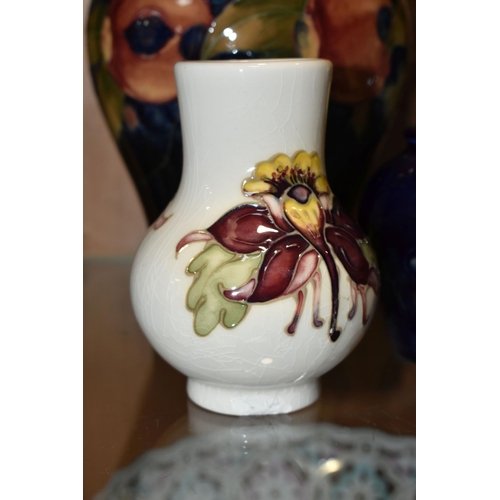 377 - FIVE MOORCROFT POTTERY VASES, all af, comprising a small Pomegranate pattern vase, height 8.5cm (sec... 