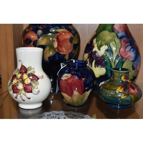 377 - FIVE MOORCROFT POTTERY VASES, all af, comprising a small Pomegranate pattern vase, height 8.5cm (sec... 