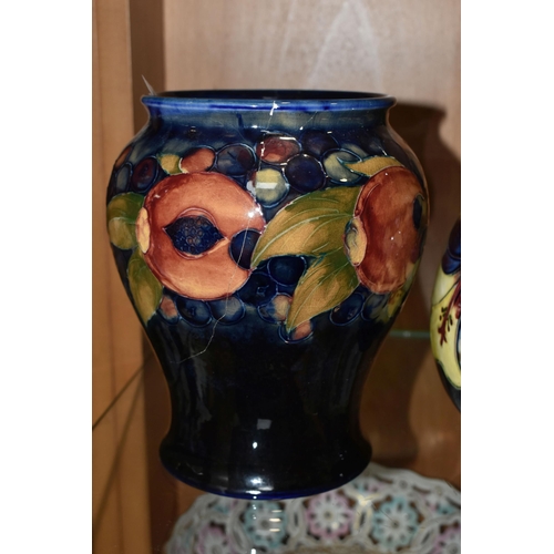 377 - FIVE MOORCROFT POTTERY VASES, all af, comprising a small Pomegranate pattern vase, height 8.5cm (sec... 