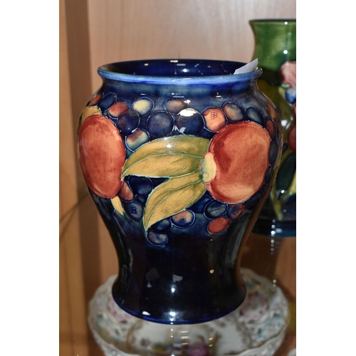 377 - FIVE MOORCROFT POTTERY VASES, all af, comprising a small Pomegranate pattern vase, height 8.5cm (sec... 