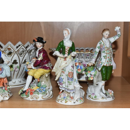 378 - A GROUP OF NINETEENTH AND TWENTIETH CENTURY CONTINENTAL PORCELAIN, to include four Sitzendorf figure... 