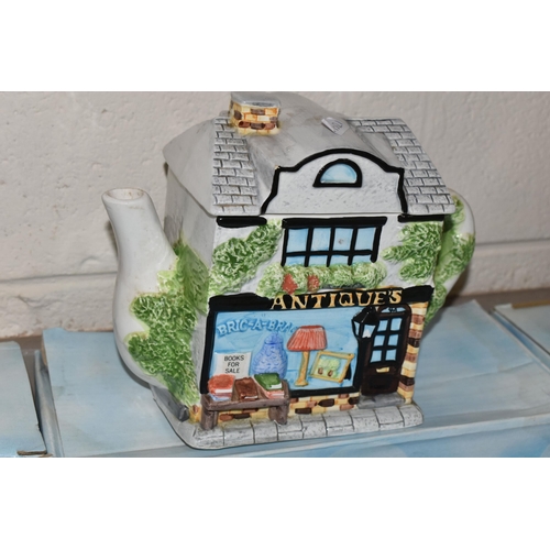 379 - TEN BOXED ANNIE ROWE 'THE VILLAGE' NOVELTY TEAPOTS AND UTENSIL JAR, all af, comprising 'Provisions/G... 