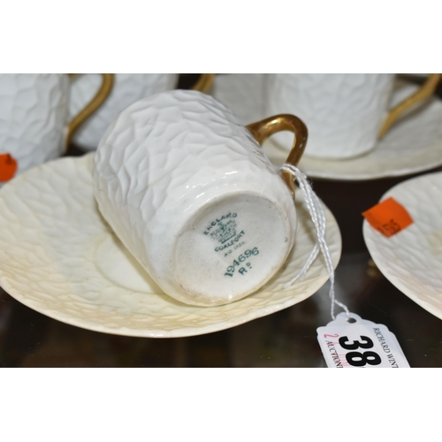 384 - A GROUP OF AYNSLEY AND COALPORT TEAWARE, comprising six white textured Coalport coffee cans with gil... 