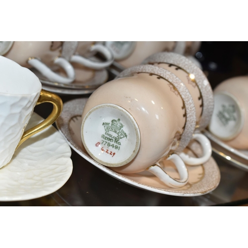 384 - A GROUP OF AYNSLEY AND COALPORT TEAWARE, comprising six white textured Coalport coffee cans with gil... 