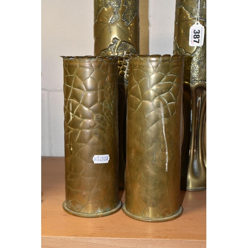 387 - TWO PAIRS OF TRENCH ART VASES, comprising two engraved with bunches of holly and the dates 1914 and ... 