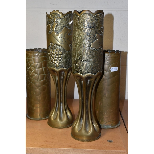 387 - TWO PAIRS OF TRENCH ART VASES, comprising two engraved with bunches of holly and the dates 1914 and ... 