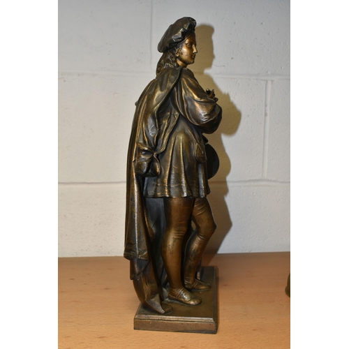 388 - A BRONZED SPELTER SCULPTURE OF AN ARTIST, standing with paintbrush and artwork, resting on a classic... 