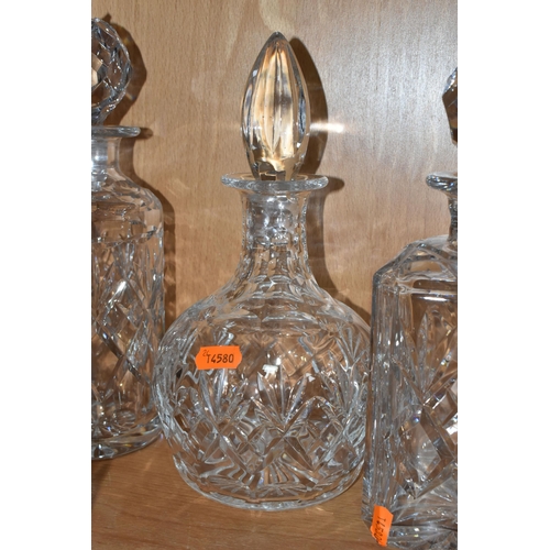 405 - A STUART CRYSTAL ICE BUCKET AND FOUR CRYSTAL DECANTERS, ice bucket measures: height 13.5cm x diamete... 