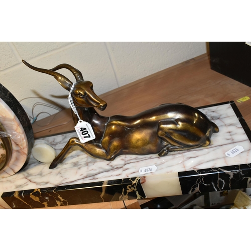 407 - A FRENCH ART DECO MARBLE MANTEL CLOCK, with figure of a deer or antelope beside the circular clock, ... 