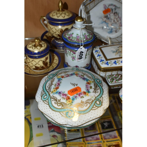 409 - A GROUP OF LIMOGES PORCELAIN, to include a near pair of ewers, height 21cm, a tray painted with flow... 